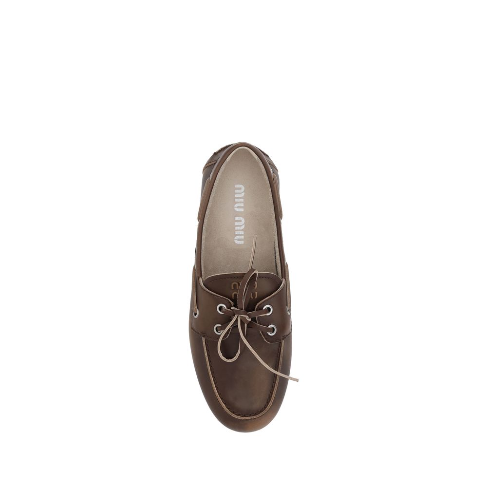Miu Miu Brown Calf Leather Bos Taurus Slip-On Loafers - immagine 7